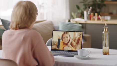Senior-Woman-Chatting-with-Granddaughter-on-Video-Call
